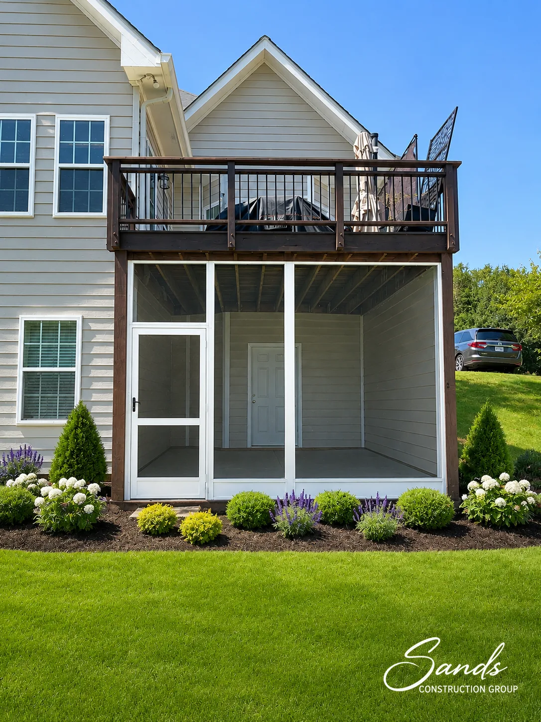 Porch and screen room by Sands Construction Group