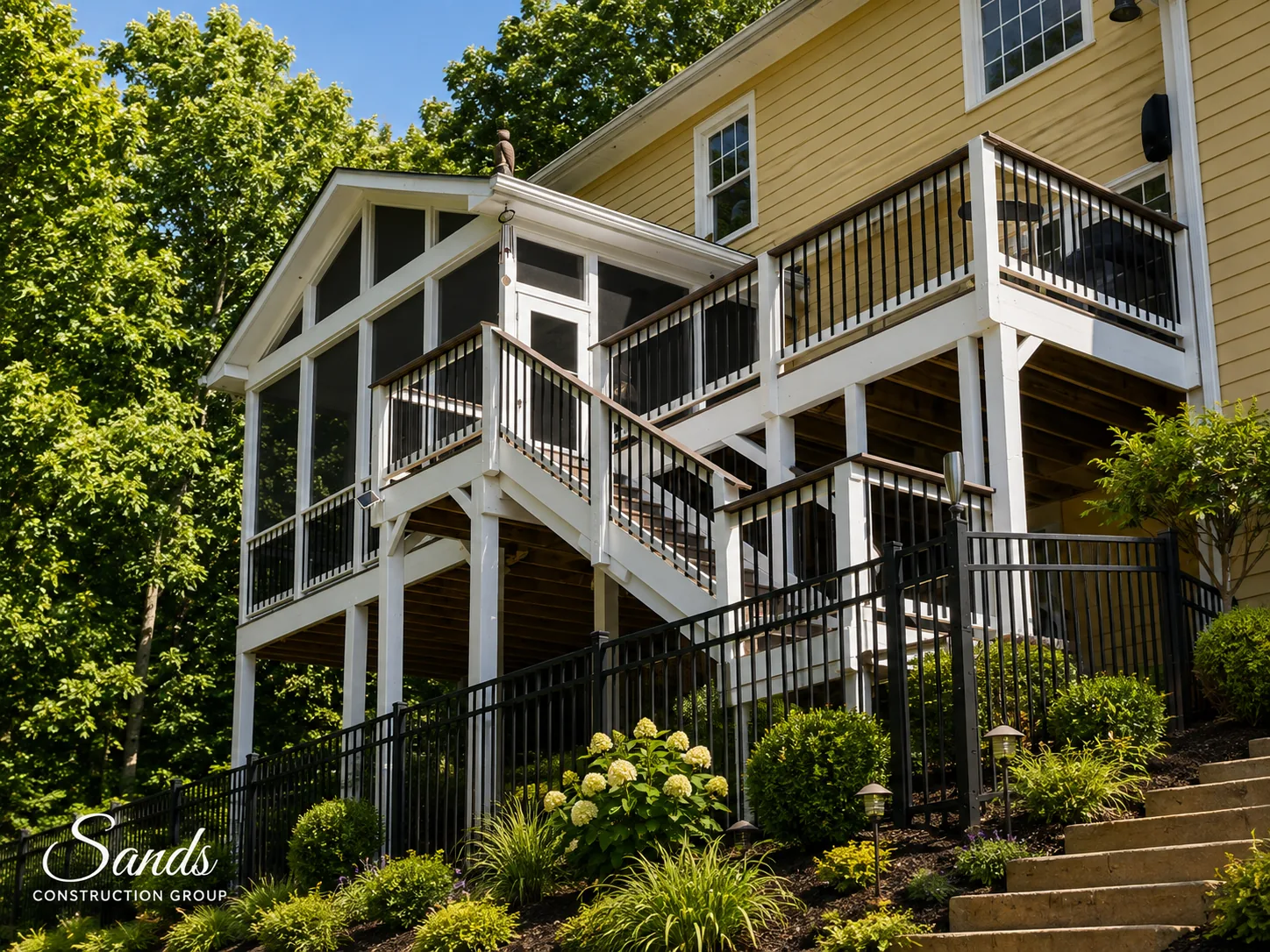 Porch and screen room by Sands Construction Group