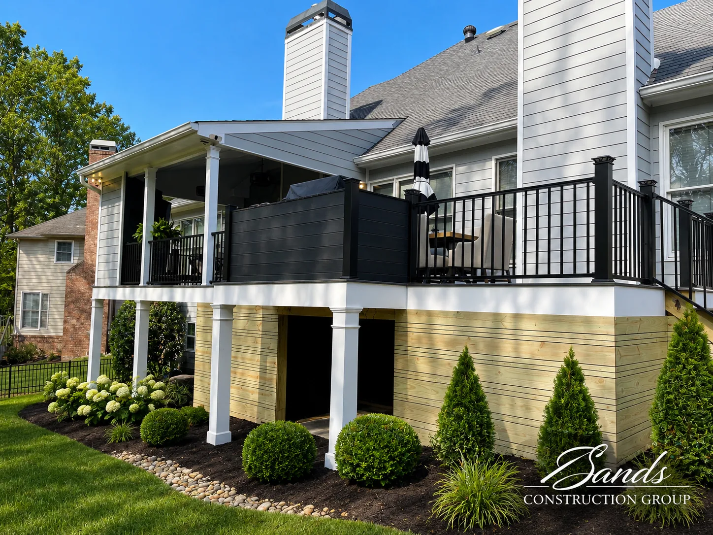 Porch and screen room by Sands Construction Group